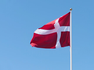 Real Danish flag flutters in the wind