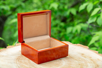 Small elegant retro casket of precious wood for storing valuables and jewelry