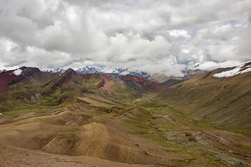 Fototapeta na wymiar Rainbow Mountain originally known as Vinicunca is located in the Andes in Cusco region of Peru