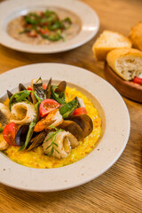 risotto with seafood in a restaurant on the table