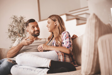 loving couple relaxing on the couch on a free evening