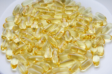 Fish oil in capsules on a white background. Omega 3.