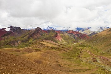 Rainbow Mountain originally known as Vinicunca is located in the Andes in Cusco region of Peru