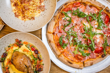 italian food, pasta, tomatoes, pizza, collage on the table
