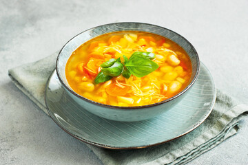 Bowl of minestrone soup with   noodle and vegetables
