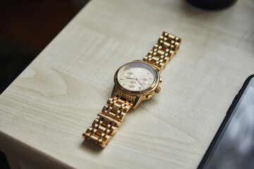 Men's classic watch (clock) on the table.