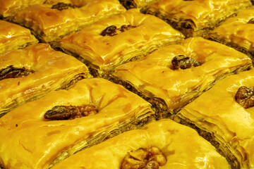 Pakhlava or baklava with walnuts, close-up, selective focus