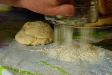 woman kneading dough