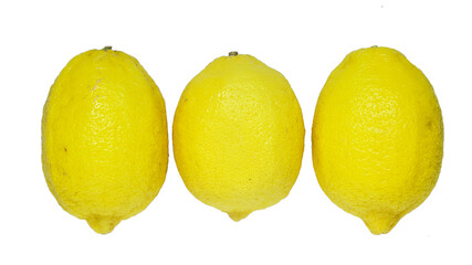 Top view of three yellow fresh lemons.