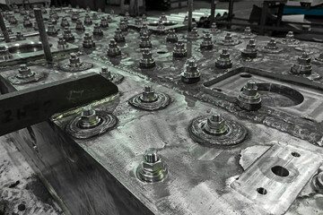 Fragment of a metal structure during the assembly process. Abstract technical background, metallurgical equipment. Part of the crystallizer.