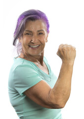 Happy elderly aged senior woman raising fists in winning gesture and celebrating success. Mature woman gaining prize or hitting jackpot. Win and success concept - 354427492