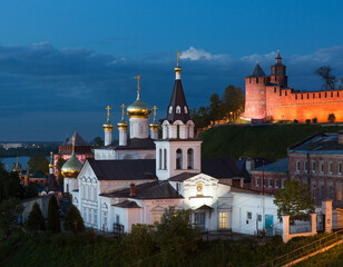 Fototapeta na wymiar Nizhny Novgorod. Stunning evening view of the Kremlin with illumination and the Church of Elijah the Prophet in the foreground