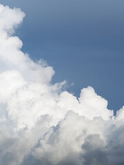 View on a soft white fluffy clouds and blue sky..
