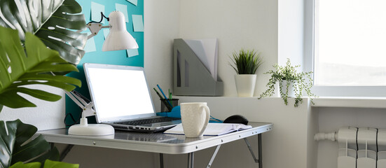 Home office workplace with laptop. Modern creative workspace at home. Banner