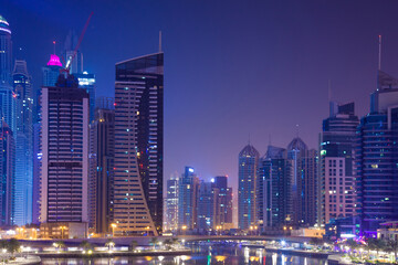 Fototapeta na wymiar DUBAI - OCTOBER 17.2018: Skyscrapers in Night Dubai Marina. Editorial.