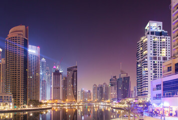 Fototapeta na wymiar DUBAI - OCTOBER 17.2018: Skyscrapers in Night Dubai Marina. Editorial photo.
