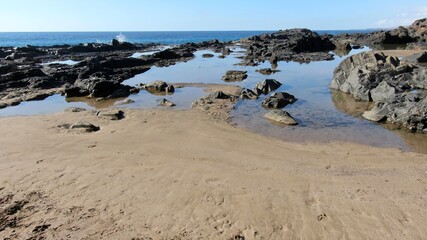 where the land meets the sea and forms paradise