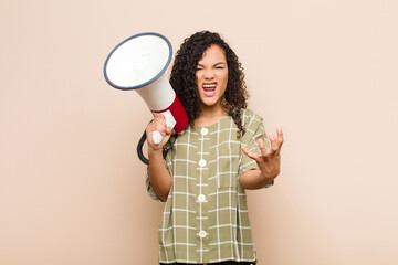 young black woman looking angry, annoyed and frustrated screaming wtf or what‚Äôs wrong with...