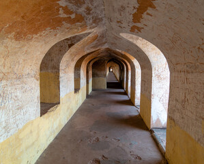 The arcaded interiors of the ancient labyrinths of the Bhulbhulaiya inside the Bara Imambara complex in Lucknow.