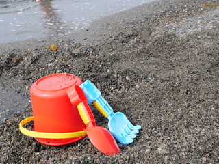 Children playing in the sand on the beach