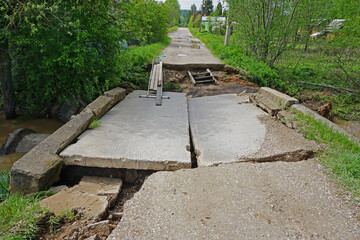 destroyed bridge after flooding