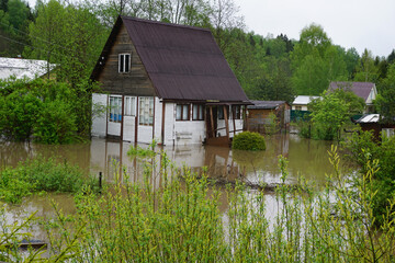 Fototapeta na wymiar flooding houses with rising water