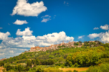 Fototapeta na wymiar Montepulciano town and surrounding landscape in Val d'Orcia region of Tuscany, Italy.