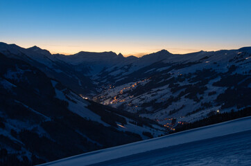 Scenic view of ski region Saalbach Hinterglemm in the Austria alps by night.