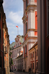Poznan, Poland - May 05, 2015: Old Town Street Near Fara Poznanska Baroque Parish And Collegiate Church