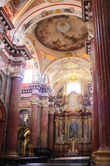 Fototapeta na wymiar Poznan, Poland - May 05, 2015: Columns And Interiors Of A Fara Poznanska Baroque Parish And Collegiate Church