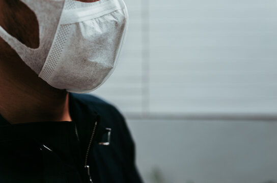 Double exposure of healthcare And Medicine concept. The men wearing a mask to protect the coronavirus (COVIT-19) and modern virtual screen interface.