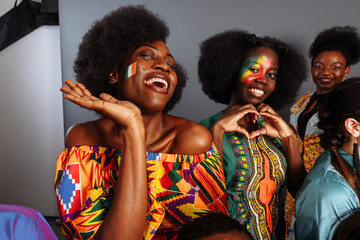 Happy multi ethnic, multicultural young students have a party looking at camera, smiling, posing together at meeting, tolerance and racial equality concept