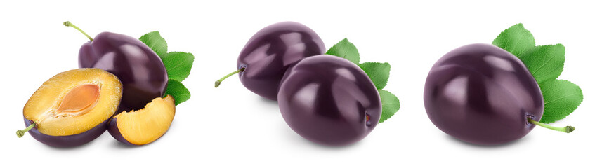 fresh purple plum and slices with leaves isolated on white background with clipping path and full depth of field. Set or collection