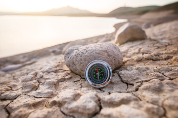 compass on the cracked ground