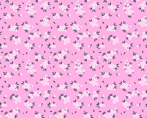 Cute floral pattern in the small flower. Ditsy print. Motifs scattered random. Seamless vector texture. Elegant template for fashion prints. Printing with small white flowers. Pale pink background.