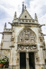 View of Amboise Saint Hubert gothic chapel. Saint Hubert Chapel houses the tomb of the Renaissance Man Leonardo da Vinci. Amboise, Valley of the river Loire. France.