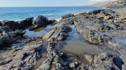 where the land meets the sea and forms paradise