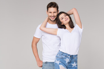 Fototapeta premium Happy summer cute couple wearing blue jeans