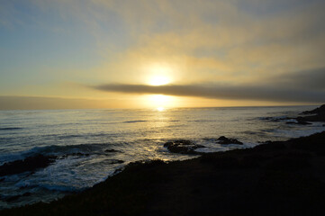 Nube cruzando el sol