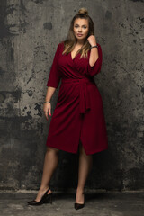 Fototapeta premium Sensual beautiful blonde woman posing. Girl with long curly hair.