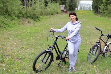 Obraz premium sporty woman on a bicycle