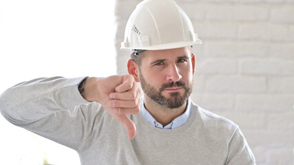 Portrait of Young Engineer doing Thumbs Down