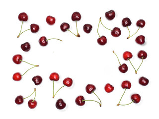 Obraz na płótnie Canvas Fresh cherries isolated on white background. Knolling concept with copy space.