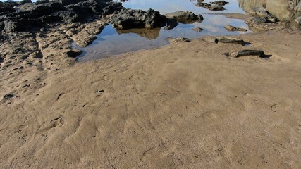 where the land meets the sea and forms paradise