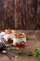 Dessert with strawberry, yogurt and granola