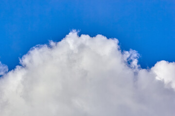 texture of fluffy clouds against a blue sky and fresh air