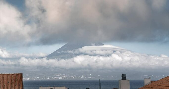 4k Timelapse Video clip of Mount Pico Volcano, Pico island azores. Time Lapse view towards ocean with clouds passing by on sunny day.