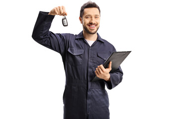 Auto mechanic holding car key