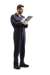 Full length shot of a male worker writing a document