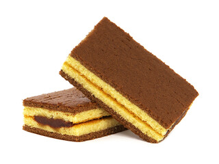 Sponge cake bar with cocoa cream filling isolated on white